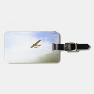 Kleines Flugzeug mit blauem Himmel Gepäckanhänger