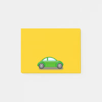 Kleines grünes Auto auf gelbem Pfosten