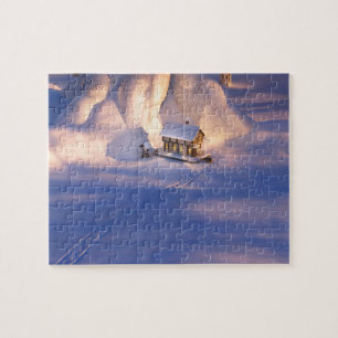 Kleines Haus im Schneepuzzle
