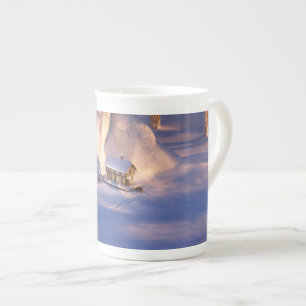 Kleines Haus in der Schnee-Tasse Prozellantasse