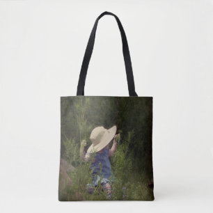 Kleines Mädchen auf dem Schwung Tasche