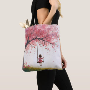 Kleines Mädchen auf einem Kirschbaumschwung Tasche