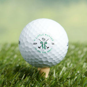Kleines Minigolf-Baby zur Bekanntgabe mit grüner S Golfball