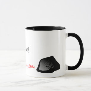 Klumpen des Kohlenkaffees Tasse