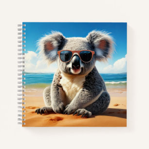 Koala an einem sandigen Strand Notizbuch