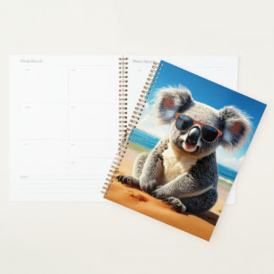 Koala an einem sandigen Strand Planer