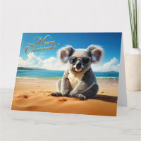 Koala an einem Sandstrand Frohe Weihnachten