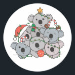 Koala Christmas Tree Funny Animal Christmas Runder Aufkleber<br><div class="desc">Koalas look like a Christmas tree. With fairy lights and Santa's hats they are perfekt for Christmas. Every koala lover is happy about cute animals for the winter holidays.</div>