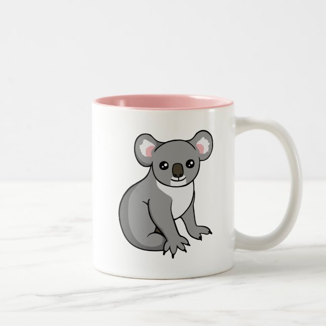 Koala gris heureux mignon dessinant la tasse rose (Droit)