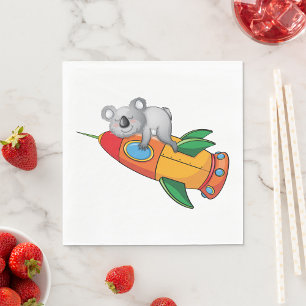 Koala schlafen bei einer farbenfrohen Rakete Serviette