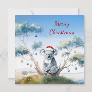 Koala sitzt in einem Gummibaum Frohe Weihnachten