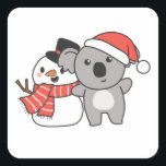 Koala With Snowman In Winter For Christmas Quadratischer Aufkleber<br><div class="desc">Koala with snowman in winter for Christmas - a snowman for winter and Christmas. A winter greeting in the cold season for the holidays. Christmas koala with snowman.</div>