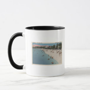 Kolonialstrand, VA - ein Sonnenbad nehmende u. Tasse