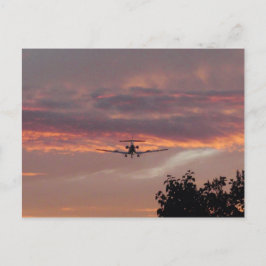 Kommerzielle Jet-Landung bei Sonnenuntergang Postkarte