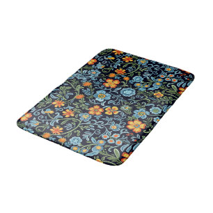 Komplexe Blumenkunst: Blaue und orangefarbene Blum Badematte