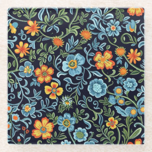 Komplexe Blumenkunst: Blaue und orangefarbene Blum Glasuntersetzer
