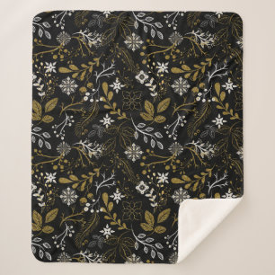 Komplexes florales Muster mit Gold und Weiß Sherpadecke