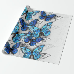 Komposition von weißen und blauen Schmetterlingen Geschenkpapier