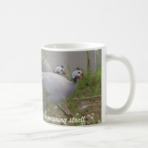 Korallen-u. Lavendel-Guinea auf einem Morgen… Kaffeetasse