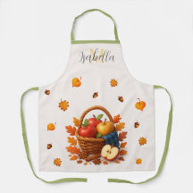 Korb mit Äpfeln und Blätter im Herbst