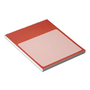 Körniger warmer roter Hintergrund Notizblock