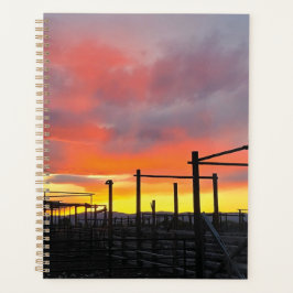 Korralschreiber bei Sonnenuntergang Planer