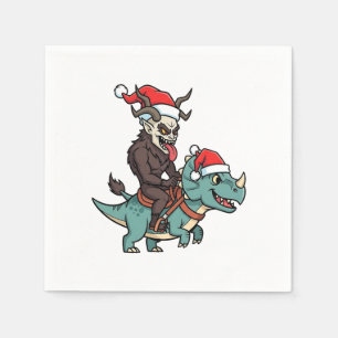 Krampus reitet auf einem Dinosaurier-Santa-Weihnac Serviette