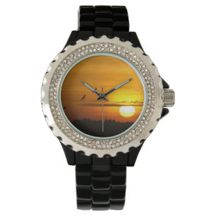 Krane bei Sonnenaufgang Armbanduhr