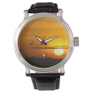 Krane bei Sonnenaufgang Armbanduhr