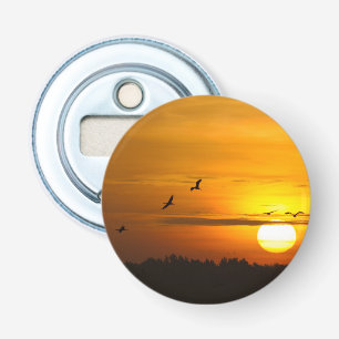 Krane bei Sonnenaufgang Flaschenöffner
