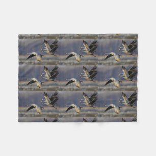 Kräne im Flug Fleecedecke