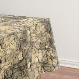 Kratzer auf einem leicht gepunkteten Khaki Tischdecke
