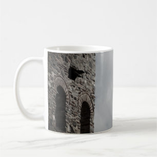 Kreuz in der Tasse des Skies-Fotos
