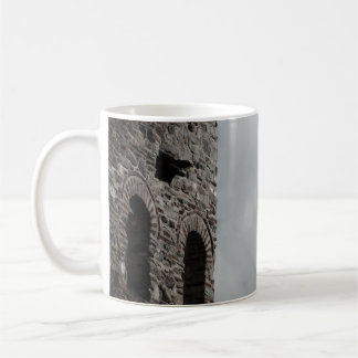 Kreuz in der Tasse des Skies-Fotos
