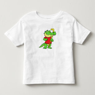 Krokodil im Feldhockey mit Stick Kleinkind T-shirt