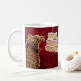 Kuchen, der Kitty-Kaffee-Tasse isst Kaffeetasse