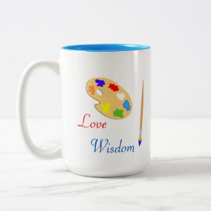 Kunstpalette mit Pinsel & Text auf Weiß Zweifarbige Tasse