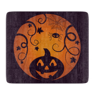 Kürbisgesicht und Spinne der Kürbislaterne Hallowe Schneidebrett
