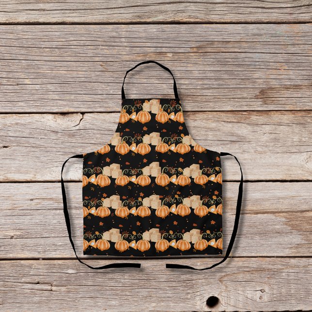 Kürbiskuchen und braune Zuckerwürfel schwarz Schürze (Von Creator hochgeladen)