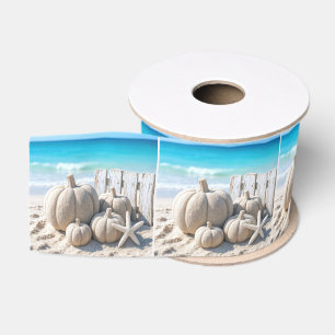 Kürbisse und Seesterne am Strand aus Sand Ripsband