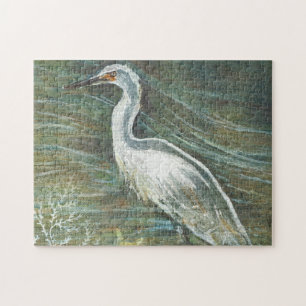 Küstenvogel Silberreiher beim Waten im Wasser Kuns