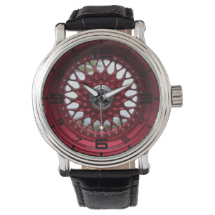 La maille rouge roule la montre des hommes