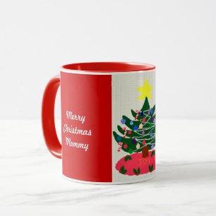 La maman de Joyeux Noël a décoré la tasse d'arbre
