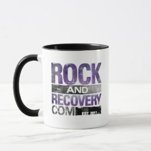 La roche de FM de sommet et la tasse de
