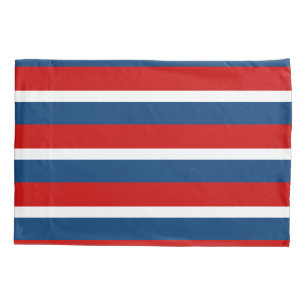 La taie d'oreiller rayée blanche et bleue rouge