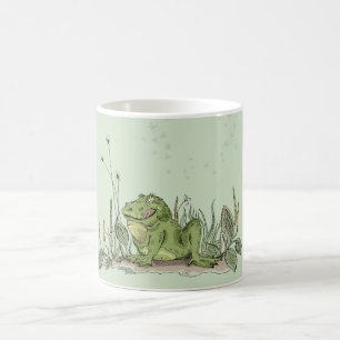La tasse avec l'image drôle de grenouille verte