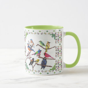 La tasse modelée par oiseaux chanteurs colorés d