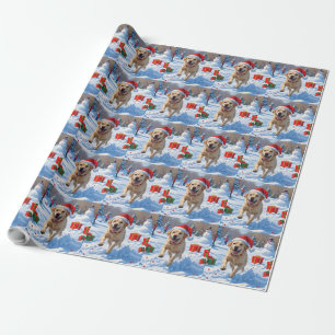 Labrador Hund läuft im Schnee mit Weihnachtshut Geschenkpapier