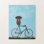 Labrador Retriever Dog Sitzen auf Vintagem Fahrrad<br><div class="desc">Das Puzzle mit einem bezaubernden Schokoladenlabrador,  das an einem blauen Sommertag auf einem altmodischen Fahrrad sitzt.</div>