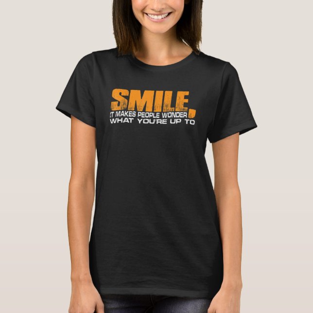 Lächeln macht die Leute fragen, was sie vorhaben T-Shirt (Vorderseite)